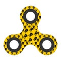 Yellow design fidget spinner with bearing with black skull. Modern children`s hand spinning toy on white background