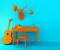 Yellow desk and chair on blue background. Composition with table, guitar, ball, decorative deer head and baseball cap. Royalty Free Stock Photo