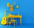 Yellow desk and chair on blue background. Composition with table, guitar, ball, decorative deer head and baseball cap. Royalty Free Stock Photo