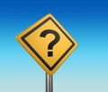 Yellow diamond shaped road sign with question mark. Royalty Free Stock Photo