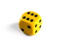 Yellow dice isolated on white background