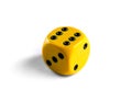 Yellow dice isolated on white background