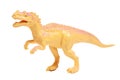 Yellow dinosaur toy isolated on white background.