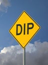 Yellow Dip Sign On Blue Sky and Cloud Background Royalty Free Stock Photo