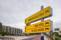 Yellow direction board with information about several hotels in Cascais, Portugal