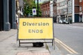 Yellow Diversion Ends road sign in a UK city street Royalty Free Stock Photo