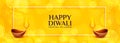 Yellow diwali banner with two diya design