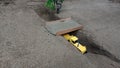 The yellow DIY Tractor has succeeded in building an alternative bridge