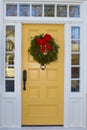Yellow Door with Wreath
