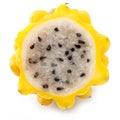 Yellow dragon fruit slice with white flesh and crunchy black seeds on white background