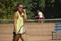 Yellow dress tennis woman decided face won point. Tight fist