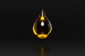 yellow drop of fuel or oil isolated on black background Royalty Free Stock Photo