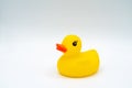 Yellow duck with red beak baby bath toy isolated on white background Royalty Free Stock Photo