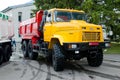 Yellow dump truck KrAZ-65033