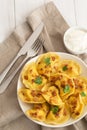 Yellow dumplings with turmeric, fried onions and parsley Royalty Free Stock Photo