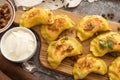 Yellow dumplings with turmeric, fried onions and parsley Royalty Free Stock Photo