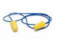 Yellow earplugs with blue band Royalty Free Stock Photo