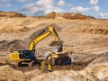 Yellow earth mover at a construction site