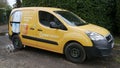 Yellow EDF Energy Van Side View Parked in a Road in Surrey UK Royalty Free Stock Photo