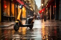 A yellow electric scooter is parked on cobblestone streets in the city.