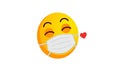Yellow Emoji Ball Blowing Kiss In Medical Mask On White Background. Concept Of The Outbreak Of The Covid19 Virus And