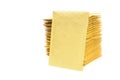 Yellow envelope leaning on a huge stack of bubble mailers Royalty Free Stock Photo