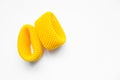 Yellow EPE fruit nets close-up isolated. Expanded polyethylene foam mesh for Fruit Wrap To prevent bumps. Royalty Free Stock Photo
