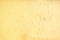 yellow erode painted concrete wall,grunge rough texture background