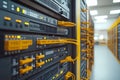 Yellow ethernet cables connected to a network switch in a server room symbolizing digital communication organized network infra