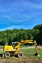 Yellow Excavator in Action