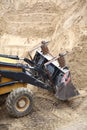 Yellow excavator construction site Royalty Free Stock Photo