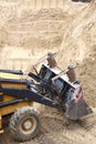 Yellow excavator construction site Royalty Free Stock Photo