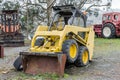 Yellow excavator in a grader parked Royalty Free Stock Photo
