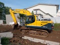 Yellow Excavator on Construction Site for Earthmoving and Groundwork. Royalty Free Stock Photo