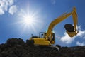 Yellow excavators are digging the soil in construction site Royalty Free Stock Photo
