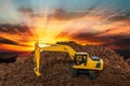 Yellow  Excavators are digging the soil in the construction site. Royalty Free Stock Photo