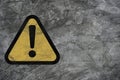 Yellow exclamation caution sign or warning symbol print screen on wall texture background for notification error and maintenance Royalty Free Stock Photo