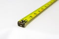 Yellow extended tape measure Royalty Free Stock Photo