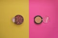 Yellow eyeshadow lying on a bright pink and yellow background, with a brush for makeup Royalty Free Stock Photo