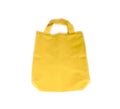 Yellow fabric bag isolated on white background.