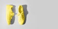 Yellow female gumshoes. Trendy color Ultimate Grey and Illuminating of the 2021 year