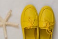 Yellow female shoes on a white background