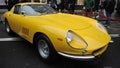 Yellow Ferrari 275 , front-engined V12-powered grand touring automobile with two-seater coupÃÂ© and spider body produced by Ferra Royalty Free Stock Photo