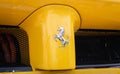 Yellow ferrari logo