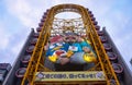 Yellow Ferris wheel of Don Quijote popular store on the Dotonbori canal. Osaka. Japan Royalty Free Stock Photo