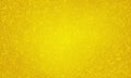 Yellow festive bright shining background with many small stars scattered chaotically. Luxurious universal background for the