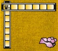 Yellow film strip and pink camera