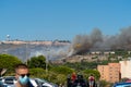 Yellow fire-fighting plane is going to throwing water on fire