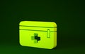 Yellow First aid kit icon isolated on green background. Medical box with cross. Medical equipment for emergency