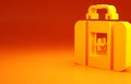 Yellow First aid kit icon isolated on orange background. Medical box with cross. Medical equipment for emergency
